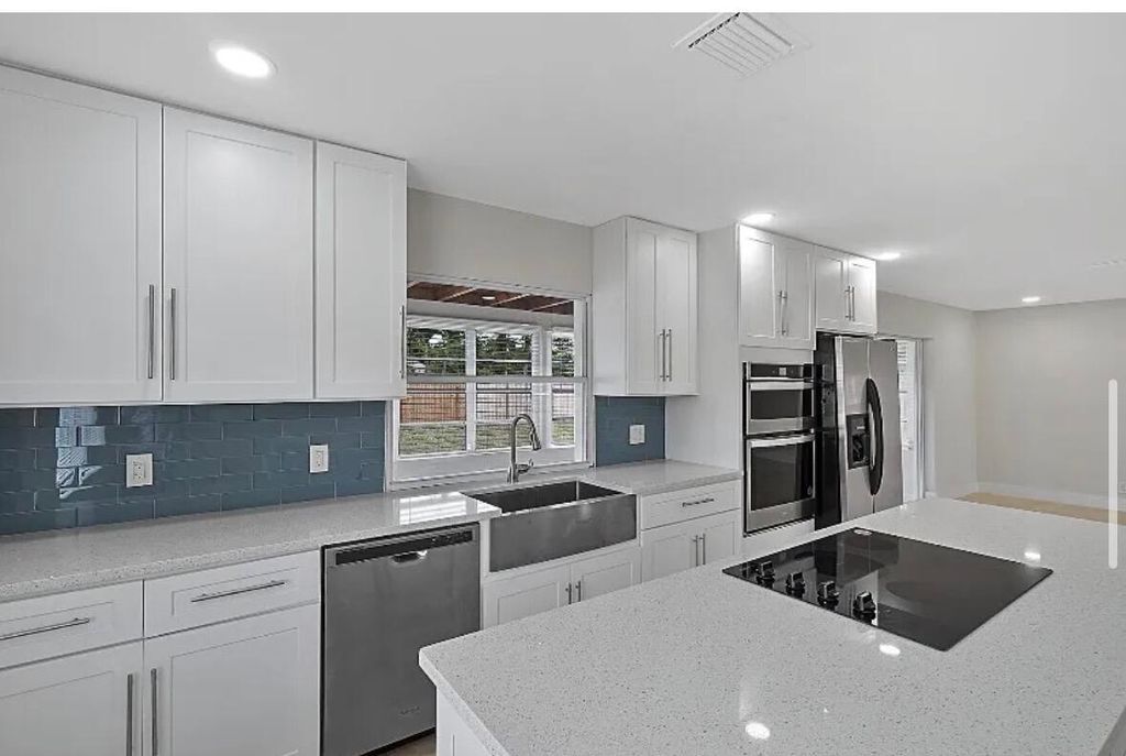 Photo of 219 SE 13th Street, Deerfield Beach, FL 33441 (MLS # B26010339)