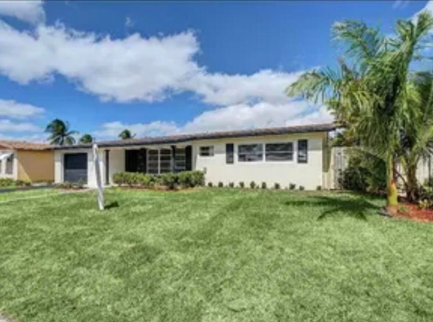 Absolutely STUNNING Single Family Home that has been COMPLETELY renovated! Beautiful porcelain tile floor throughout, Newer Kitchen with White Shaker Cabinets, Quartz Countertops, Electric Cooktop, Built in Microwave/Oven, Kitchen Island, High Hats Throughout, Very Large Bedrooms, Bathrooms Have Been Totally Renovated, Large Enclosed Patio with Mini Split A/C for added living area! HUGE Backyard with Room for a pool! This is a MUST SEE!