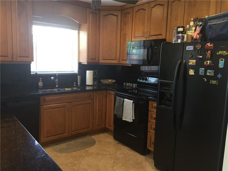 GREAT HOME IN GREAT EAST LOCATION! ALL REMODELED 2 BEDROOMS 2 BATH PLUS DEN, CUSTOM CABINETS AND GRANITE IN THE KITCHEN, SEPARATE LAUNDRY ROOM. BEAUTIFUL LOT WITH FENCE YARD, SPRINKLERS, PATIO AND ROOM FOR A POOL.  QUIET, SUPER CENTRAL LOCATION EAST OF I95  MINUTES TO THE BEACH.