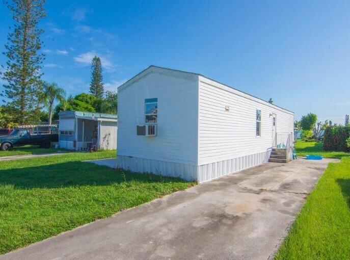 Affordable living is found in this 2-bedroom, 2-bathroom mobile home located in an ALL-AGE, pet-friendly community in the heart of Stuart! Step inside to find a fully remodeled kitchen and a spacious layout that offers comfort and functionality. The land lease is just over $900/month and includes water, sewer, trash, lawn care, and access to the community pool and clubhouse--everything you need for easy, low-maintenance living! Financing options are available! Call or message me today to schedule a private tour or ask any questions.
