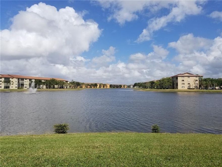 AMAZING GATED COMMUNITY resort-style 55+, desired ground floor 2/2 with a gorgeous view of the peaceful Lake, walking distance from the place of worship. Very spacious living room with a lot of light and a good vibe. Ceramic tile throughout, a lot of closets, and for perfect lifestyle unit comes with washer and dryer. Community has lots of amenities: Clubhouse, Olympic Pool, Tennis Court, Golf Course, Theatres, Billiards, Gyms, Free Transportation, Pharmacy, Cafeterias, Restaurants, and much more. Close to I-75, Pembroke Gardens Shop, Pembroke Lakes Mall & Memorial Hospital West. Thank you for showing.