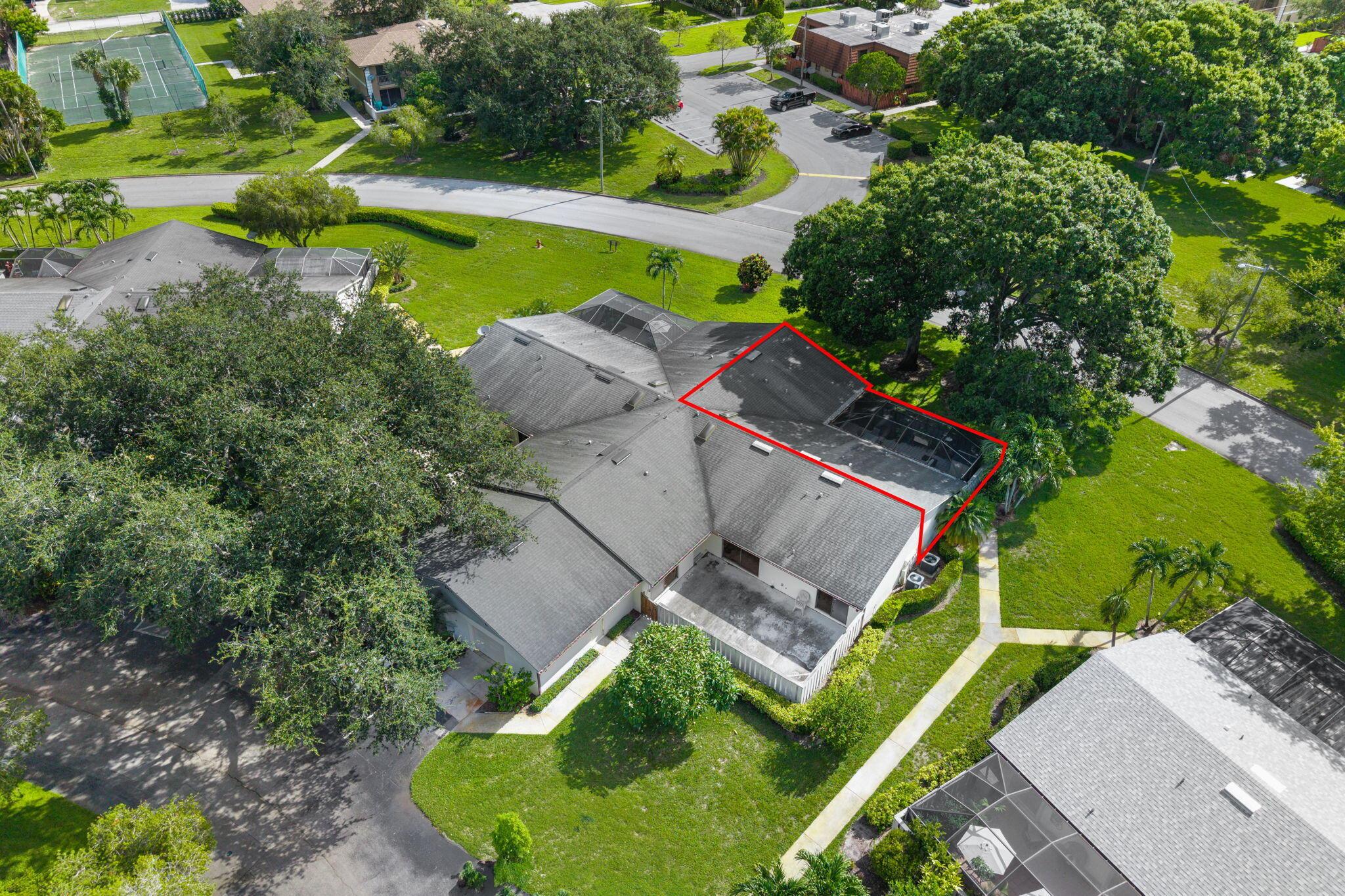 Come view and make an offer on this move in ready 2 br 2 bath Villa. As you stroll up the walkway and are greeted by the large, private screened lanai , perfect for outdoor entertaining. Large community oaks provide shade on those hot days. The Split bedroom floor plan is anchored by the central Living Room with soaring cathedral ceilings and breakfast bar overlooking the well equipped kitchen. Baths have been nicely updated and we offer a nice interior laundry closet with full size washer and dryer for your convenience. Storage Shed and Storm panels included. Walking distance to the community pool and clubhouse. Short drive to downtown, beaches and The interstate.