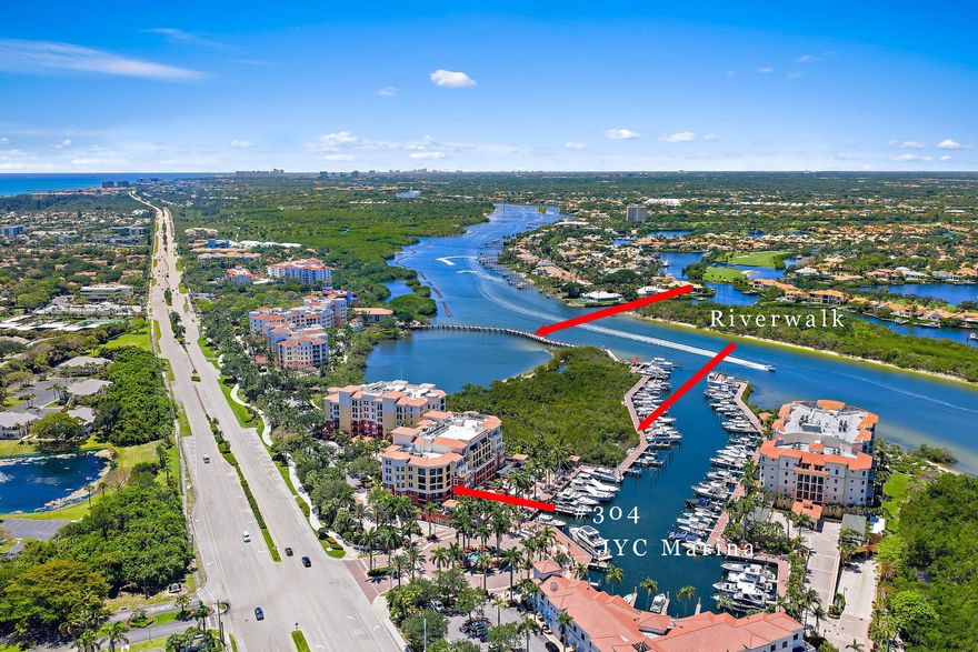 Experience luxury waterfront living at Jupiter Yacht Club, one of Jupiter's most sought-after communities offering an unmatched walkable lifestyle. Enjoy easy access to waterfront restaurants, lively bars, upscale shopping, and live entertainment, all just steps from your door. This premier gated community features a 24-hour manned guard gate, private marina with quick access to the Jupiter Inlet, and the scenic Riverwalk along the Intracoastal leading to Harbourside Place for additional dining, shopping, and entertainment. This exceptional corner residence offers 3 bedrooms, 3 bathrooms, and over 3,000 square feet of elegant living space accessed by a private elevator. Expansive wraparound balconies showcase beautiful marina views while walls of sliding glass doors fill the home with  natural light. The updated open-concept kitchen flows seamlessly into the family room and breakfast area. The expansive Grand Salon features elegant open living and dining spaces for entertaining. The sophisticated gathering space showcases Travertine flooring, waterfront views, and exceptional indoor-outdoor living within this luxury residence at Jupiter Yacht Club. Community amenities include a heated  pool, Summer kitchen with BBQ area, and assigned garage parking. Located in the heart of Jupiter, Jupiter Yacht Club offers the ultimate South Florida waterfront lifestyle and is truly a must-see community.