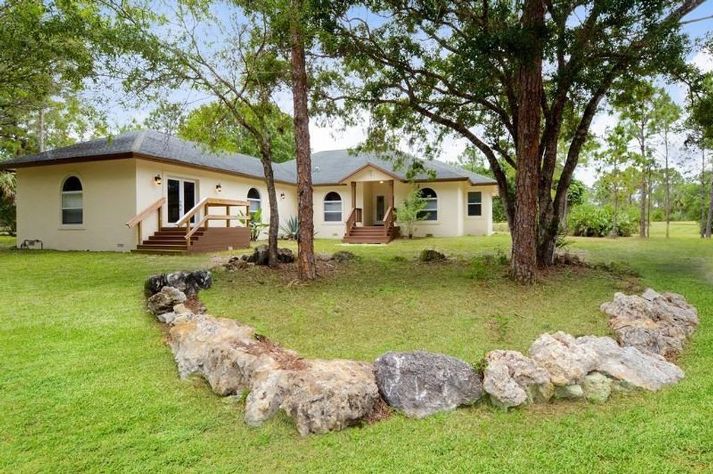 Photo of 4935 Lame Panther Lane, Loxahatchee, FL 33470 (MLS # B26031413)