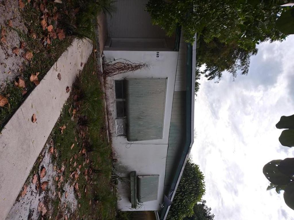 Photo of 365 SE Airoso Boulevard, Port Saint Lucie, FL 34983 (MLS # R10759329)