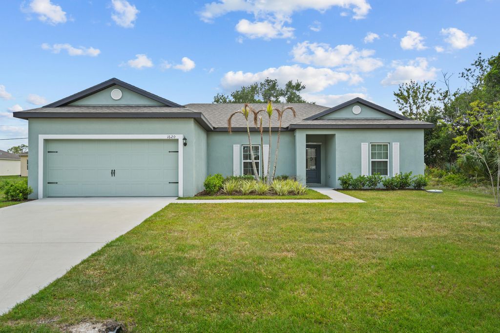 Photo of 1620 SW Escobar Lane, Port Saint Lucie, FL 34953 (MLS # B26056519)