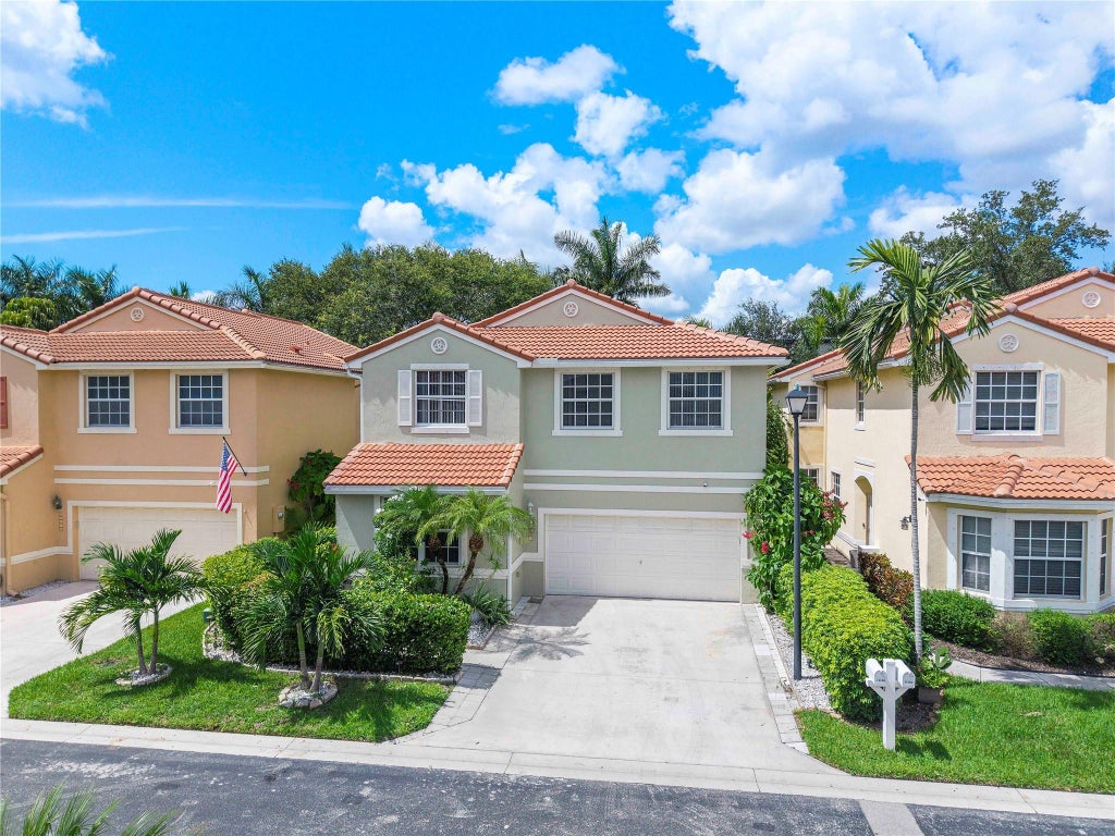 Photo of 11180 NW 46th Drive, Coral Springs, FL 33076 (MLS # F10527173)
