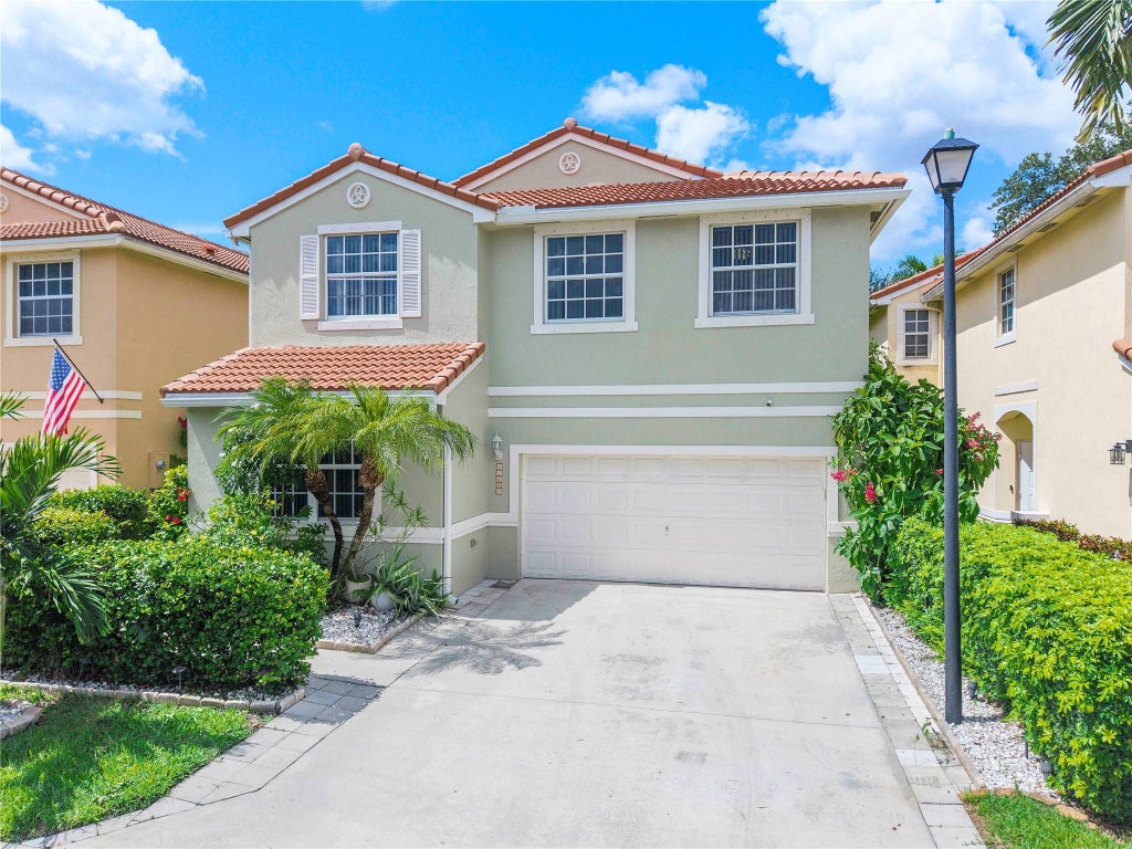 Photo of 11180 NW 46th Drive, Coral Springs, FL 33076 (MLS # F10527173)