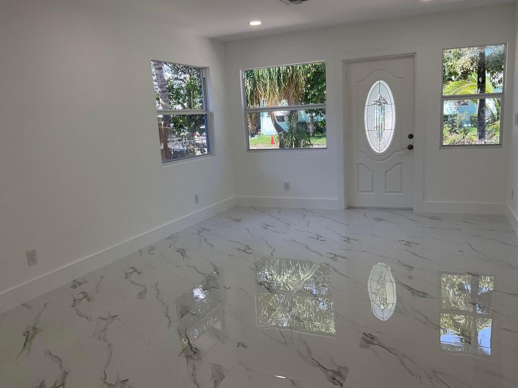 Photo of 700 Tallapoosa Street, West Palm Beach, FL 33405 (MLS # R11129578)