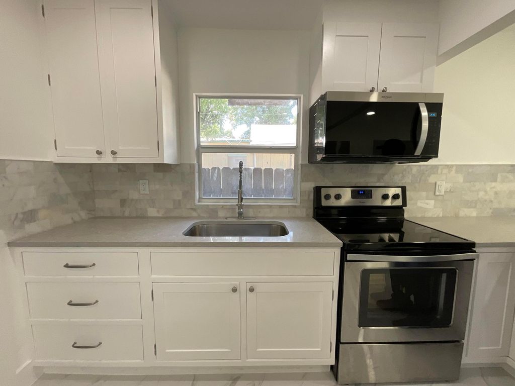Photo of 700 Tallapoosa Street, West Palm Beach, FL 33405 (MLS # R11129578)