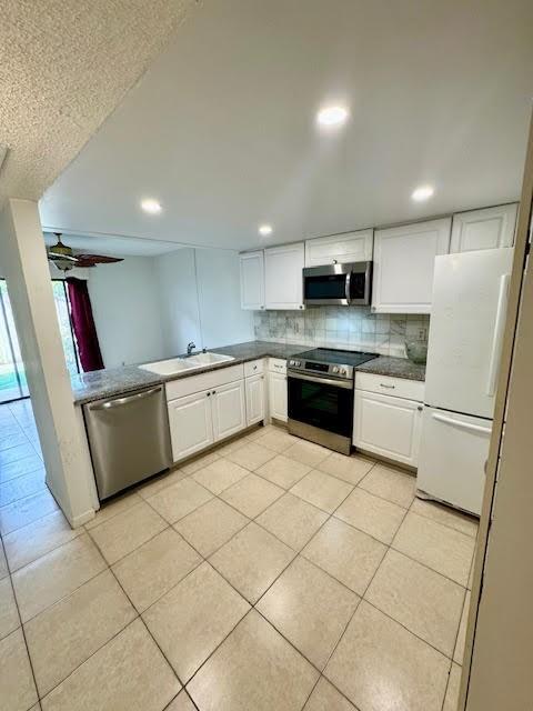 This 2 bedroom/2.5 bathroom townhouse features: washer/dryer in unit, Kitchen has white Cabinets, granite counters & Stainless Steel appliances, tile floors, New Laminate floors upstairs and private/fenced-in patio for outdoor entertaining. Water included. All Ages. See attachments. Close to shopping, dining, airport & Turnpike. Minutes from the new Hard Rock Hotel & Casino! Available March 22, 2024. 2 parking spots plus guest