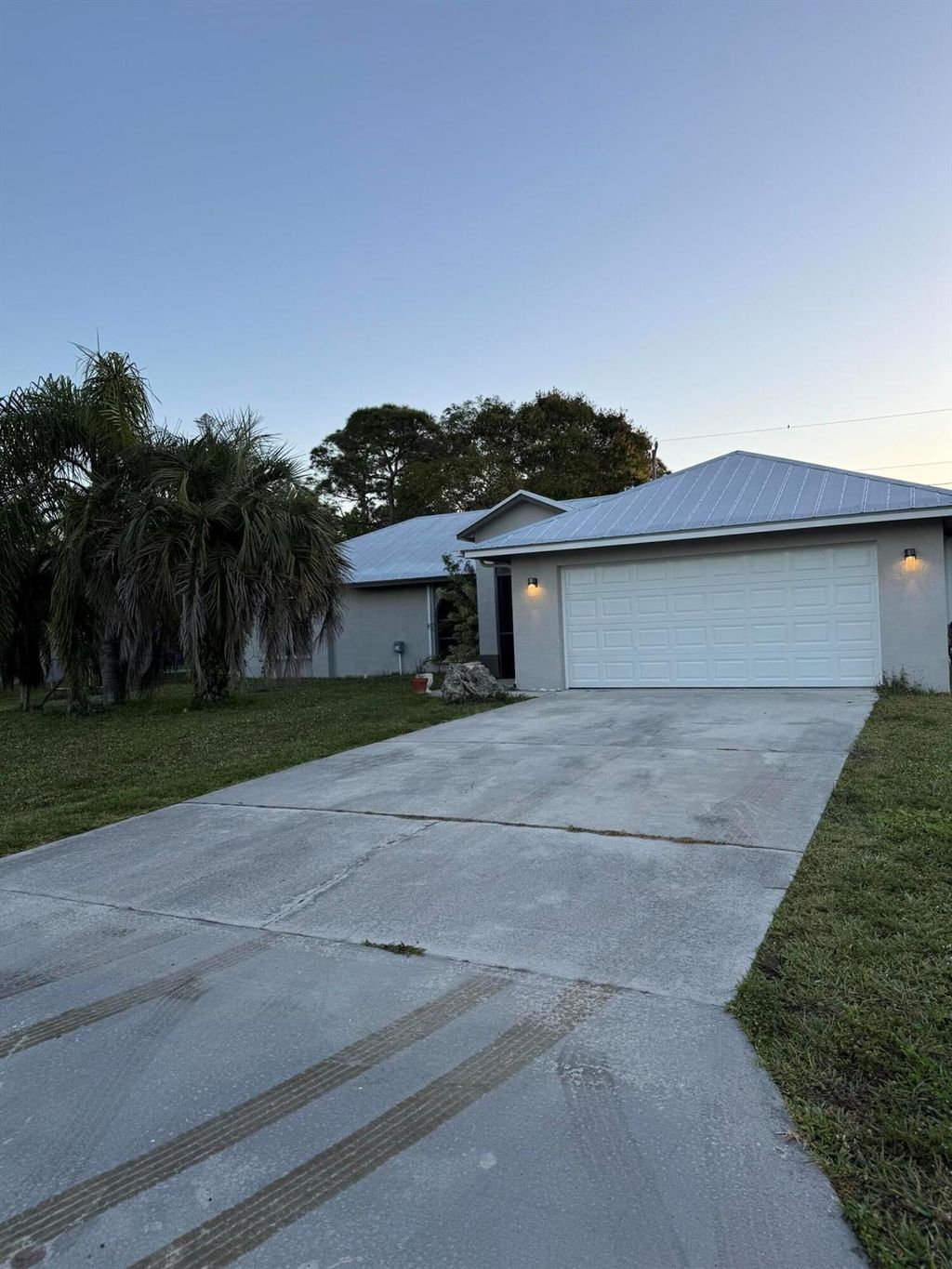 Photo of 2325 SE Beechwood Terrace, Port Saint Lucie, FL 34953 (MLS # R11061481)