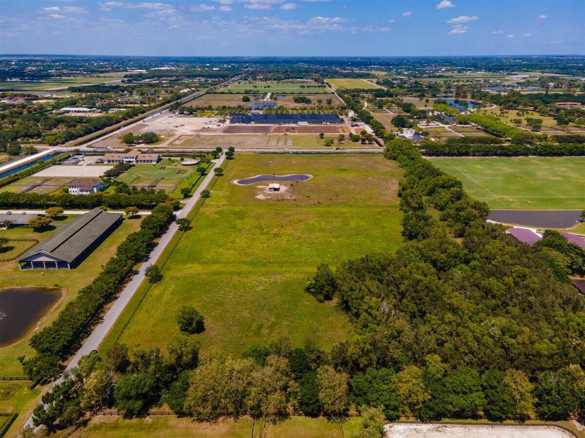 Remarkable 10 acres in a prestigious gated Equestrian community in Wellington! one of the last vacant land parcels in this community. On green lush pasture for turn outs, ready to build your barn and house.