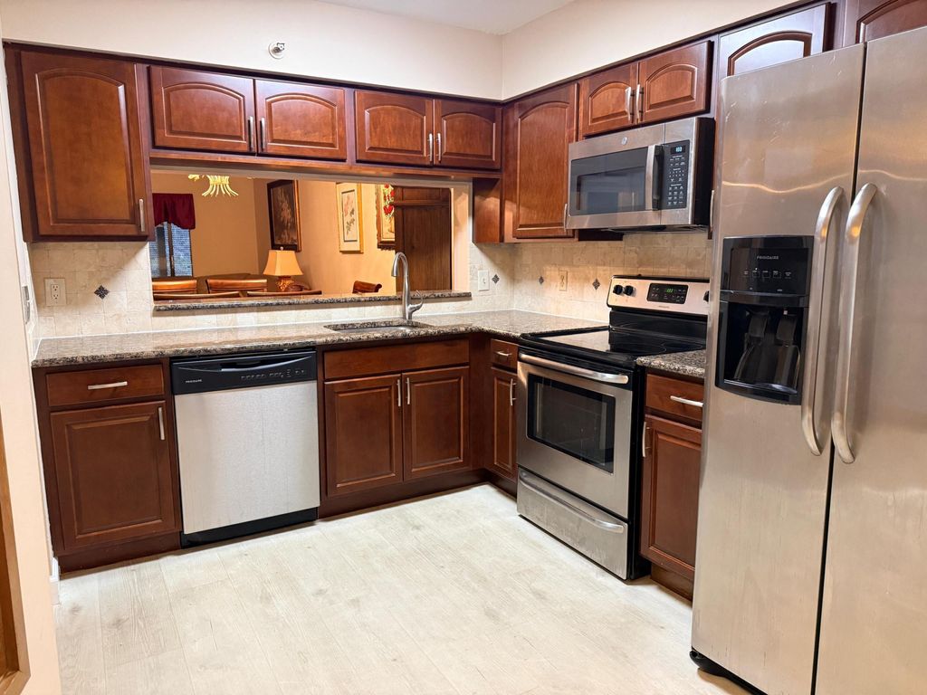 Photo of 14475 Strathmore Lane #103, Delray Beach, FL 33446 (MLS # R11159771)