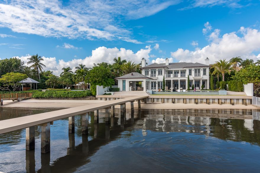 Brand new custom built waterfront Home – Completed September 2018, this estate home was designed and developed by The Aquantis Group.  The house comprises 9,634 total sq. ft. of space, 7,758 sq. ft. of indoor and outdoor living spaces, and 6,629 of air-conditioned space, featuring: 6 bedrooms; 9.5 baths; a detached guest house, seven fireplaces; a library; a custom granite motorcourt; and a two-car garage with attached carport.

Located in the historic El Cid/Prospect Park neighborhood, the property sits directly on the Intracoastal and boasts a new 100' long deep-water dock, a new sea wall, and a private beach. This ultra-luxurious island-style home is a perfect marriage of modern and transitional design and represents a harmonious blend of old and new. While every room has stunning water views, the real living happens outside.  The ground floor flows seamlessly between indoor and outdoor living areas with inviting entertainment spaces that include a 538 Sq ft covered Loggia, a 45 ft. long lap pool and attached spa, and a cabana complete with summer kitchen and a full bath.  Watch TV nestled by the warm firelight in the loggia under the cypress vaulted ceiling.  Dine in the cabana or al fresco around the firepit bar with your guests. Motorized Kevlar hurricane screens lower and rise at a touch of the button for comfort and storm protection in both the loggia and cabana.

Upon arrival, you are greeted by stunning Intracoastal views from the 24 ft. high entry foyer through the living room and loggia.  The gourmet kitchen features Italian lacquered cabinetry, Miele and Sub-Zero appliances, and boundless waterfront views.  The first floor also includes a VIP guest suite and an exquisite walnut paneled library with ensuite bath. 

The oversized hydraulic elevator leads to the second floor, which is devoted entirely to privacy, rest and relaxation. The gracious master suite consists of a spacious master bedroom with northern and eastern Intracoastal views from inside.  Step outside to the waterfront terrace â€“ complete with fire pit â€“  to enjoy expansive views while watching TV under the moonlight.  The master suite also features a morning bar and kitchenette as well as separate his and her baths.  Her bath is appointed in dolomite marble and includes an all-resin soaking tub and a shower with multiple shower heads. Attached is an oversized custom walk-in closet.

His bath has a waterproof in-wall TV and a steam shower with multiple shower heads. The attached custom closet features Armani-styled glass doors lit by warm LED light. 

As you leave the master suite through the hallway to the bedroom wing of the home, you are welcomed by incredible views of the Intracoastal. Here you can find three additional well-appointed ensuite bedrooms for family and guests. The estate also offers a separate, detached guest house â€“ perfect for live-in staff or guests requiring additional privacy. 

Amenities include a state-of-the-art chef's kitchen, seven fireplaces, 2 laundry rooms, a wine vault, motorized Lutron shades throughout, and Kolbe impact windows and doors.  The house features full home Savant and Lutron automation and a complete A/V sound system connected to over 40 ghost speakers. The most modern high tech/high touch materials and finishes are incorporated throughout. 

Enjoy the best of Florida waterfront living with all the amenities of a luxurious private resort surrounded by the natural tranquility and beauty of open water. Featuring panoramic views of water and sky, epic sunrises, and serene sunsets, 2914 Washington Road is the perfect fit for those with discerning taste. Experience a new level of luxury never available before in this area.