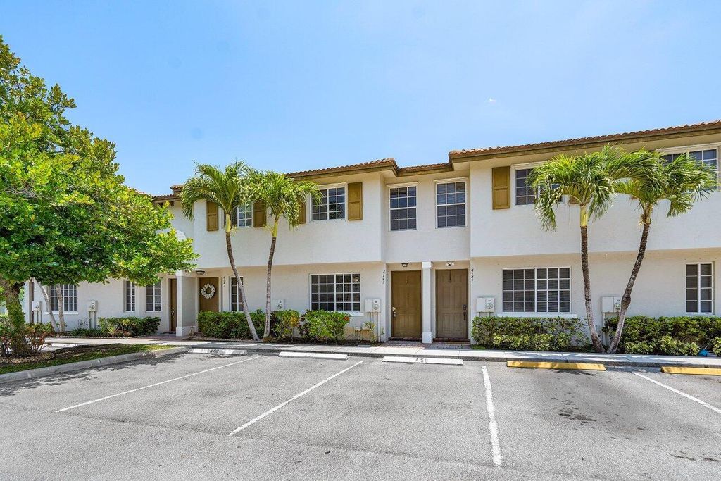 Photo of 4143 Napoli Lake Drive, Riviera Beach, FL 33410 (MLS # R10989735)