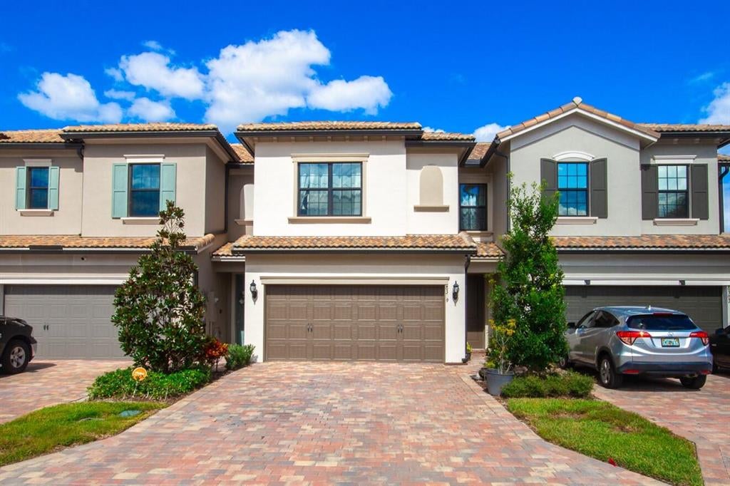 Photo of 8309 Catria Lane Ln, Lake Worth Beach, FL 33467 (MLS # R10758030)