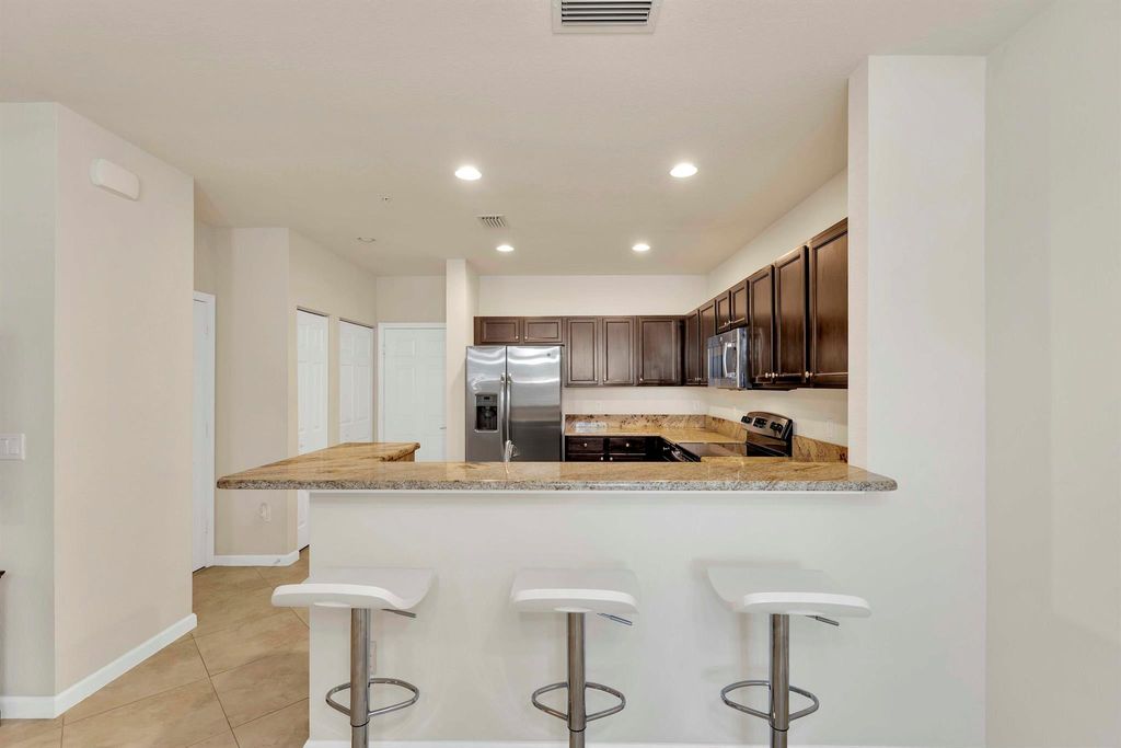 Photo of 4780 Monarch Way, Coconut Creek, FL 33073 (MLS # R10989959)