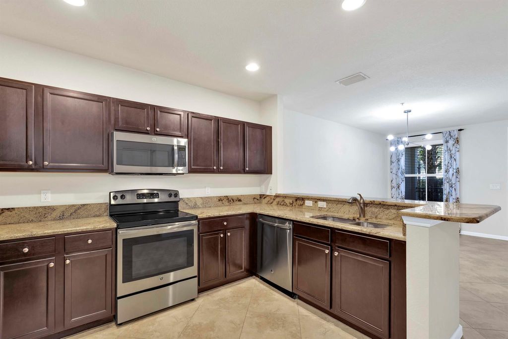 Photo of 4780 Monarch Way, Coconut Creek, FL 33073 (MLS # R10989959)