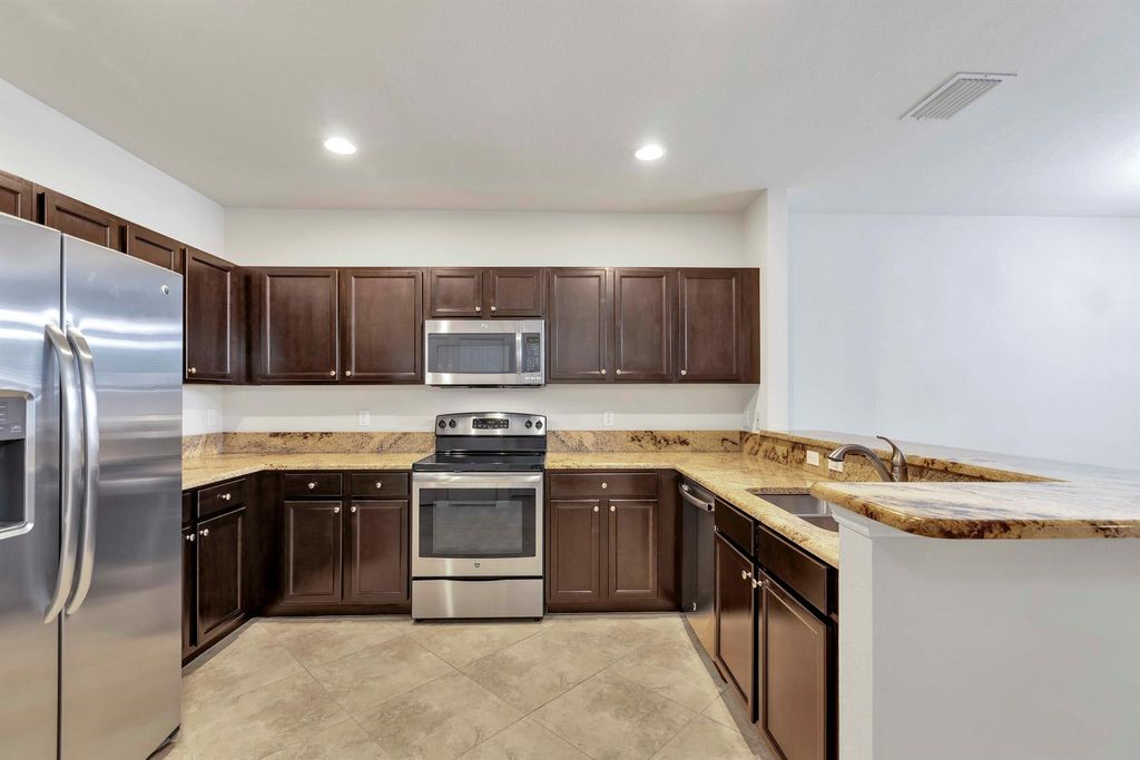 Photo of 4780 Monarch Way, Coconut Creek, FL 33073 (MLS # R10989959)