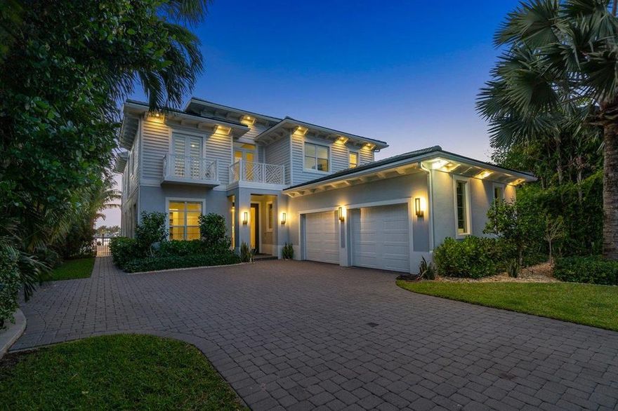 Welcome to your Modern Transitional Intracoastal-Front Home positioned on one of Hypoluxo Island's Largest Lots! Offered fully furnished and located just steps away from the Beach, Eau Resort & Spa, and all of the shops & restaurants Ocean Ave has to offer. A Boater's Delight in a No Wake Zone, 150ft private dock and two brand new boat lifts - 56,000lb, 16,000lb & floating dual jet ski dock. 6 Br, 6 Full Baths, 2 half baths, Newly Renovated Media Room, Hideaway Bar, Oversized Dining Room, Great Room/Living Area, this open-concept Smart Home is sure to entertain your most fastidious company boasting a brand new Sonos Sound System Inside & Out, Control4 Automation, Waterfall-Pergola Hot Tub & Fountain-infused infinity pool which illuminates and cascades seamlessly toward the fire pits.