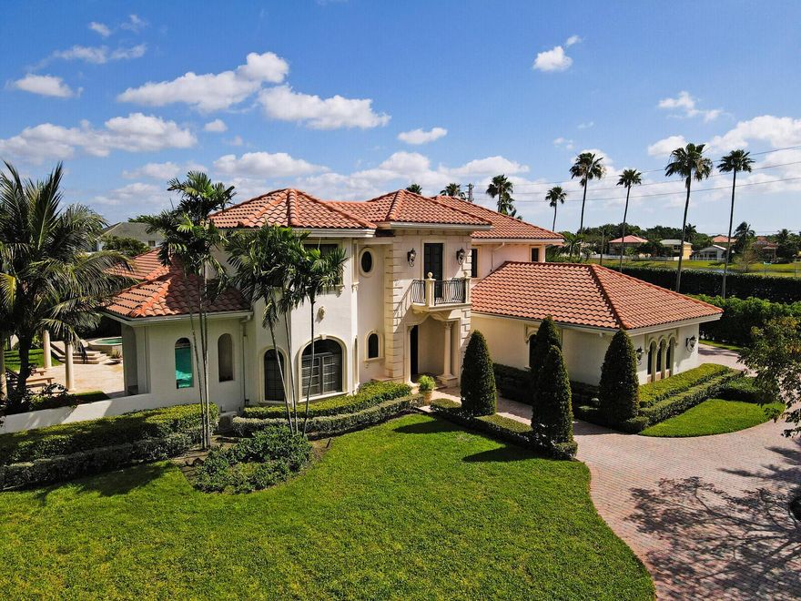 Luxury and comfort await you in this custom built two-story estate home in the fly-in community of Aero Club in Wellington. Over 5,000 square feet of living area surround a courtyard home with a beautiful one bed/one bath guest suite off the pool and patio.  Enjoy the convenience of having your plane in your 4,500 square foot hangar with 16'5'' Tail clearance and 68' width directly on the taxi way of this paved and lighted runway accommodating jets up to 12,500 lbs. This spectacular home has been meticulously updated to include many custom features such as custom-made steel entry doors leading to the main courtyard, marble flooring throughout, a wood burning fireplace. and a custom Theater room.