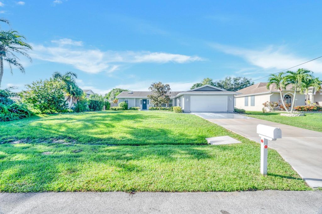 Photo of 1202 SE Mcfarlane Avenue, Port Saint Lucie, FL 34952 (MLS # R11019184)