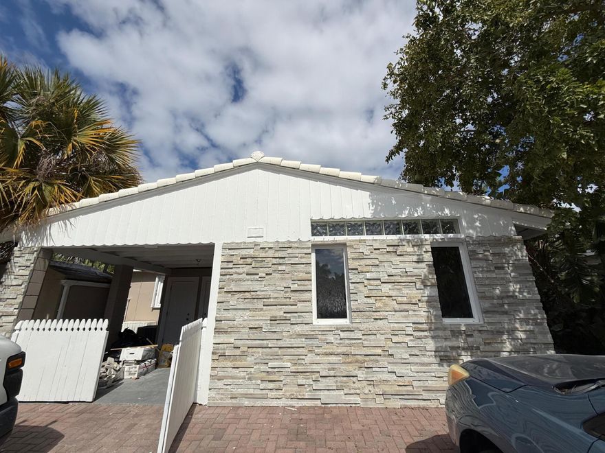 Just minutes from Delray Beach's shoreline and Atlantic Avenue, this East Delray home offers an ideal blend of location and flexibility. Freshly painted throughout, with two fully renovated bathrooms featuring custom vanities and European ceramic finishes. This 4-bedroom, 3-bath home offers over 1,900 sq ft and includes a private mother-in-law suite with its own entrance—perfect for guests or rental potential. Situated on a corner lot with a spacious backyard and private pool, ideal for entertaining. Additional features include natural gas, full-house generator, central air, and no HOA. Close to beach, dining, and downtown Delray.