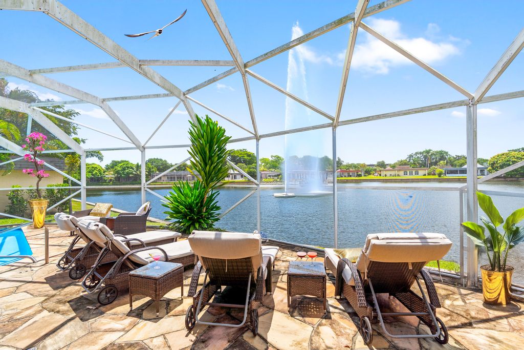 Photo of 6106 Royal Poinciana Lane, Tamarac, FL 33319 (MLS # R11163890)