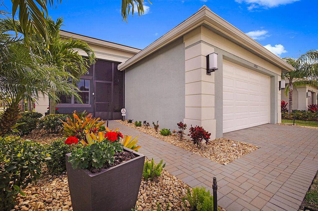 Photo of 13216 SW Blue River Road, Port Saint Lucie, FL 34987 (MLS # R10964163)