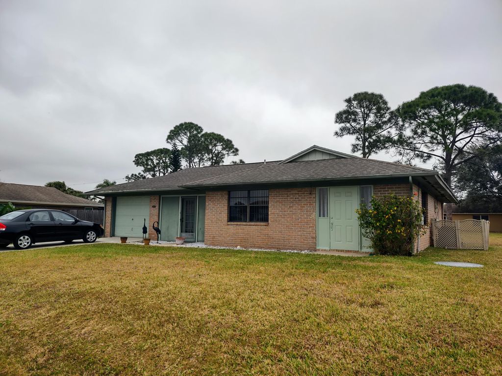 Photo of 1133 SW Jennifer Avenue Ave, Port St Lucie, FL 34953 (MLS # R10774988)