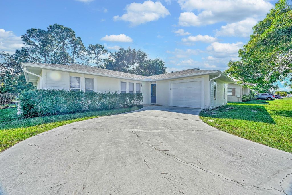 Photo of 462 NW Sherbrooke Avenue, Port Saint Lucie, FL 34983 (MLS # R11138785)