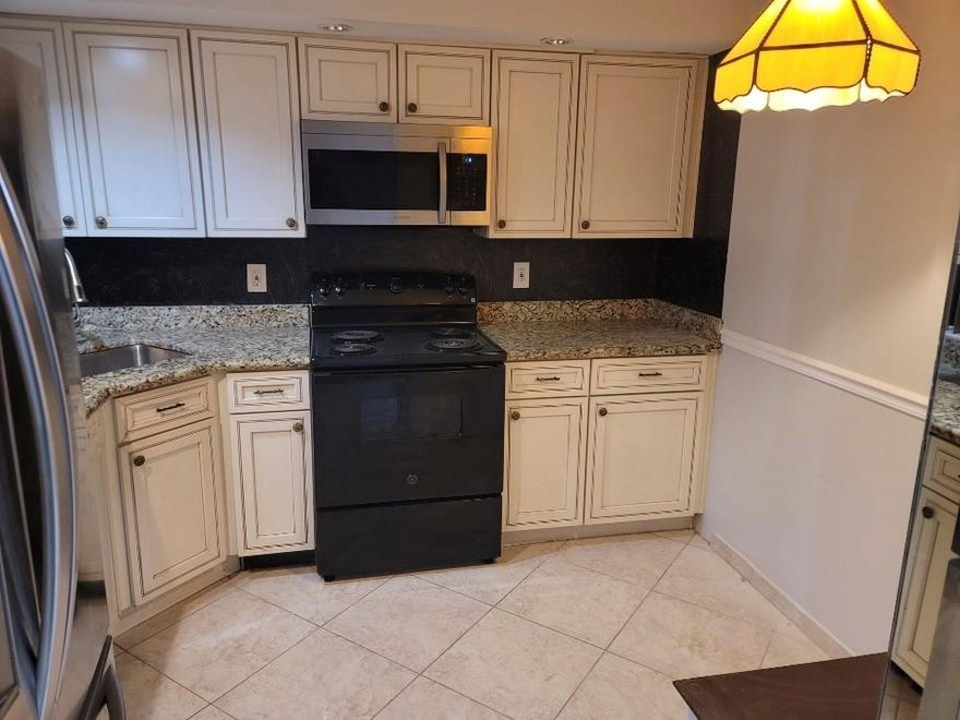 Great location near the Fl Turnpike,  entertainment , shopping,  2 community pools , tennis courts , lake front walking /biking  trail , club house, fitness room , Near the new Uptown Boca , A rated schools , FAU 3 miles away, close to beaches .  Complex is gated, secured and well maintained .