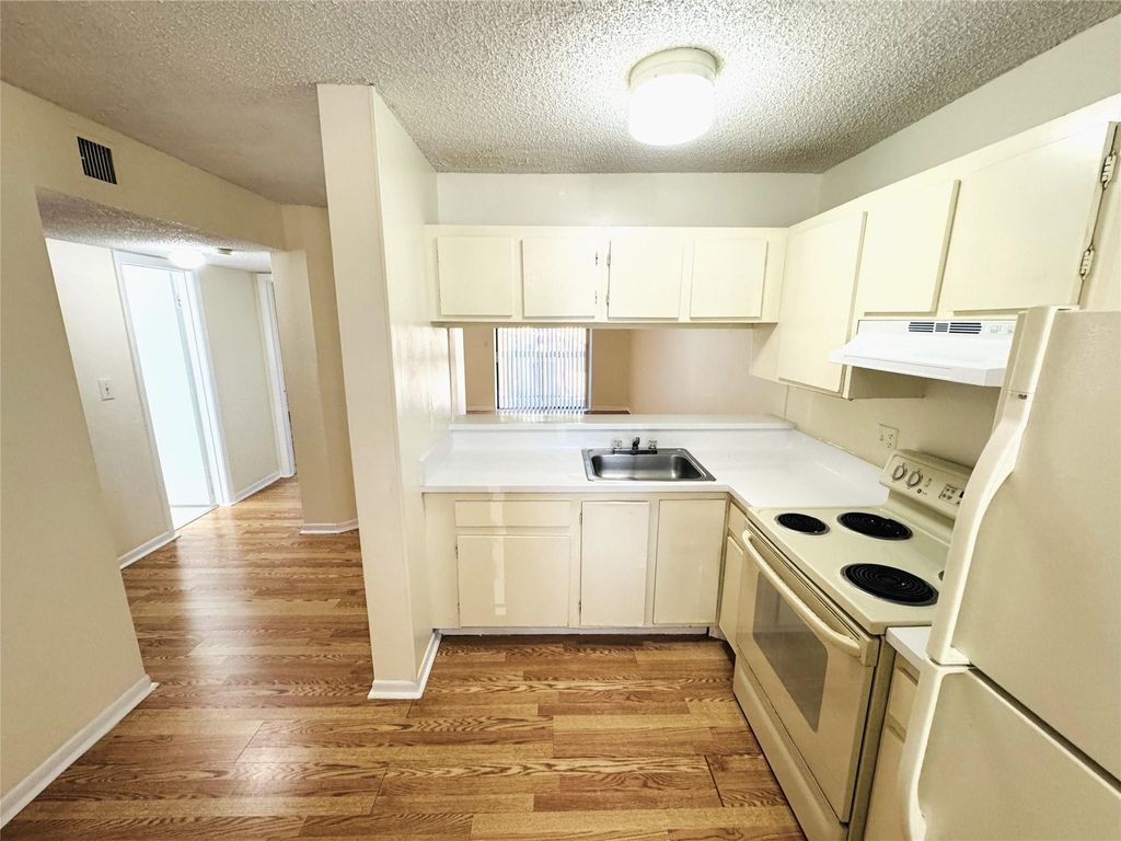 Photo of 4060 Lakeside Drive #4060, Tamarac, FL 33319 (MLS # F10477428)