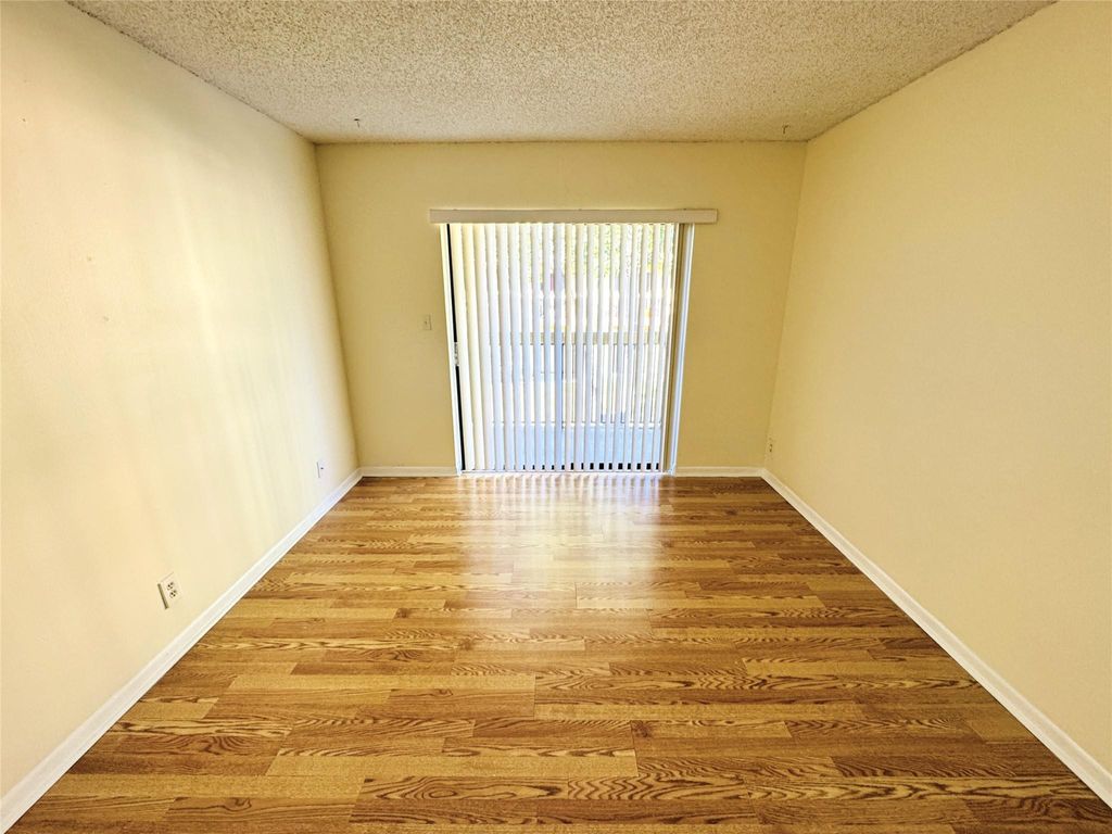 Photo of 4060 Lakeside Drive #4060, Tamarac, FL 33319 (MLS # F10477428)