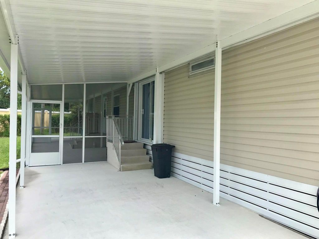 Photo of 10 SE Margarita Lane, Port Saint Lucie, FL 34952 (MLS # R11015090)