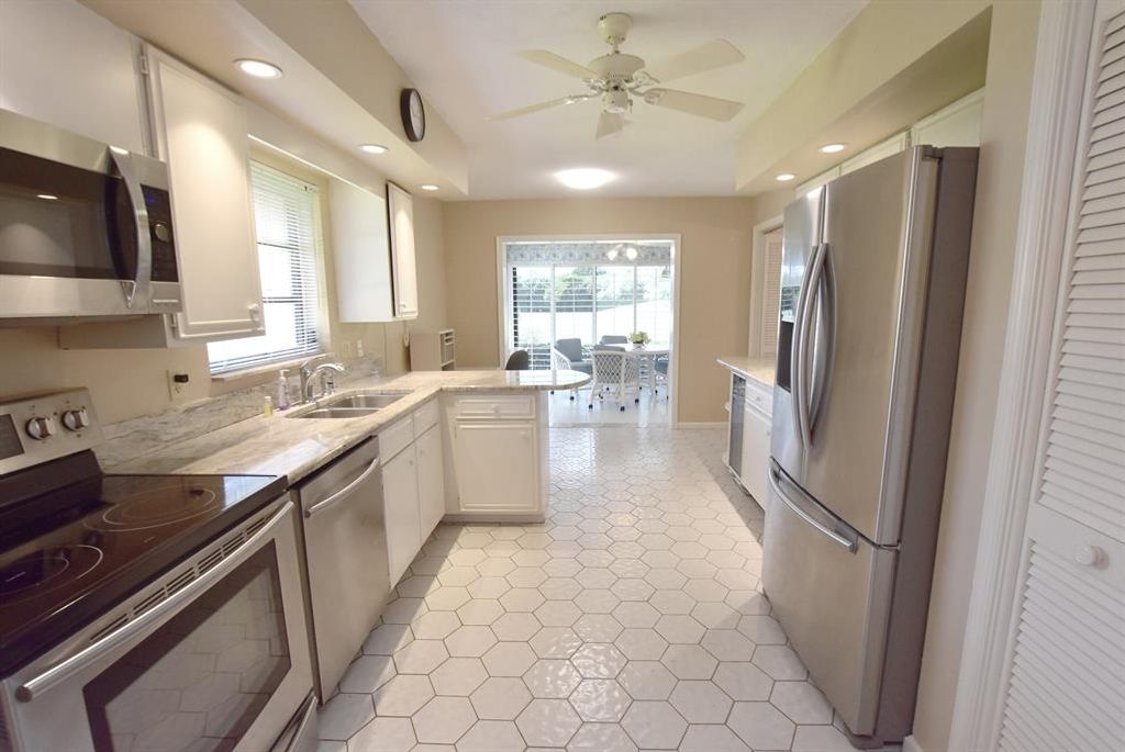 Photo of 10882 Tamarisk Trail, Boynton Beach, FL 33436 (MLS # R10723059)