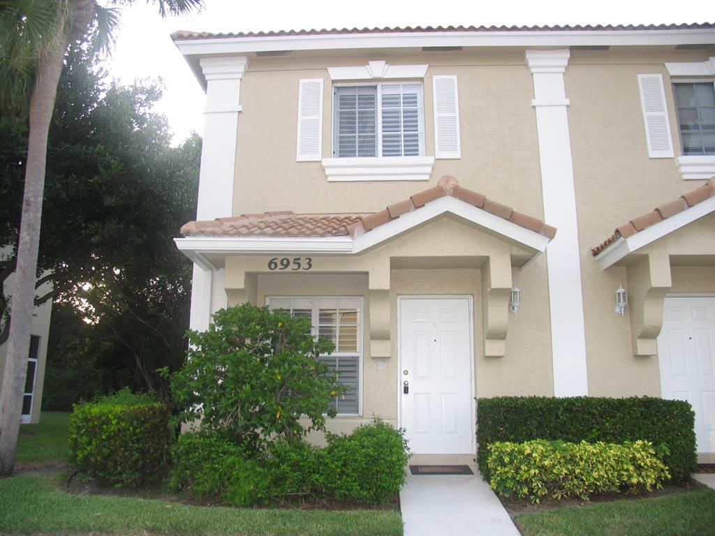 This is the perfect starter home or investor property in the desirable Smithbrooke community. This 2 story end unit townhouse has 2 bedrooms, 2 full bathrooms and 1 half bath. The first floor has tile flooring throughout the kitchen, dinning, living area and convenient half bath. The 2nd floor has wood flooring in the bedrooms, 2 full baths, dual sinks in the main bedroom. This home has a new A/C, screened patio and outside storage closet. Smithbrooke is a gated all ages community that offers a clubhouse, fitness center, racquetball court, community pool and all with a LOW HOA fee ($160 per month) that includes cable, lawn and common area maintenance and trash removal. *A* RATED SCHOOLS Coral Reef Elementary, Woodlands Middle School, Park Vista High School