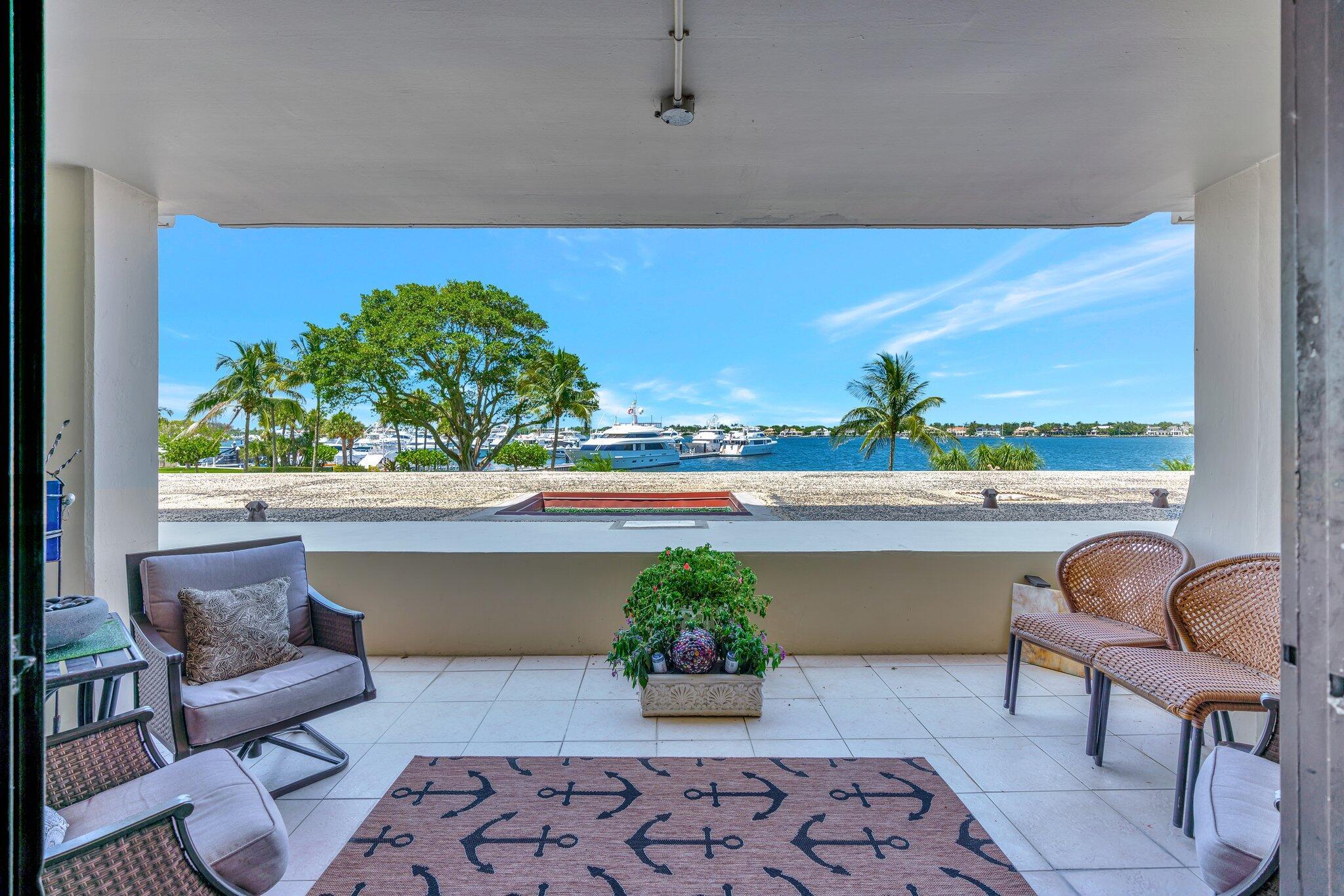 Amazing Intracoastal Views! Experience the best of coastal living in this beautifully updated 1-bedroom, 1.5-bath residence at Old Port Cove. Features include custom sink vanities, tile floors throughout, crown molding, and a stylishly upgraded kitchen - new fridge. Relax and enjoy breathtaking sunsets from your oversized patio -- a rare feature unique to this one-of-a-kind second-floor unit.Enjoy resort-style amenities: a private marina with direct access to Belle's restaurant, a state-of-the-art fitness center, heated pool with sauna, walking paths, social room, and 24/7 manned gatehouse with onsite security patrols. Perfectly located in the heart of North Palm Beach--just two blocks from the North Palm Beach Country Club, dining and the Gardens Mall, and a short drive to the beaches