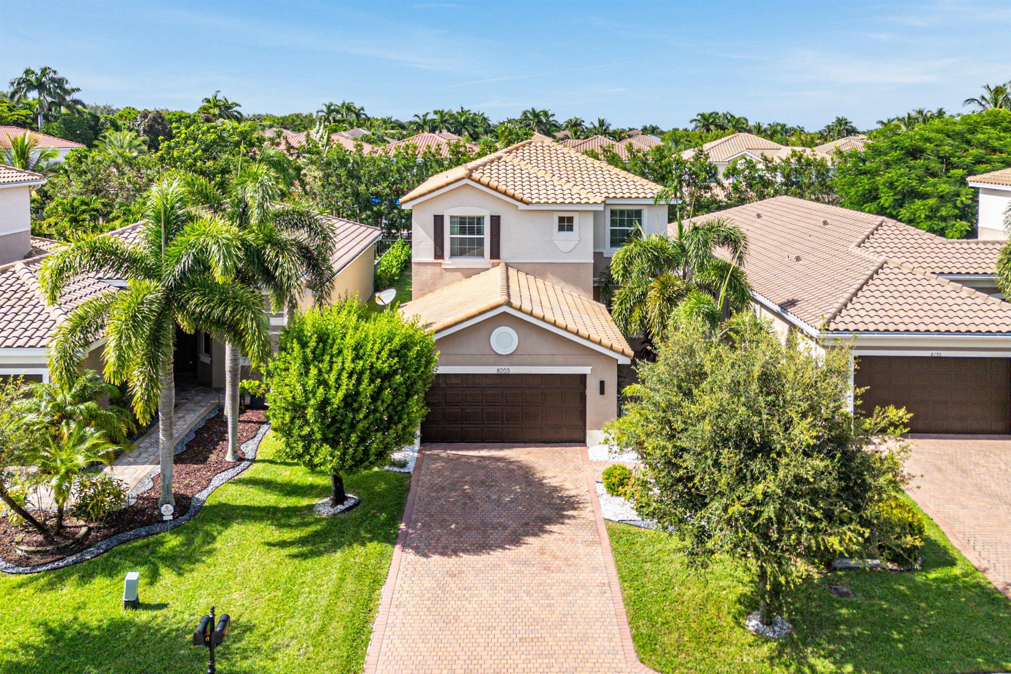 Beautiful 4 Bedroom Home with a Large Fenced Yard in Canyon Trails. This Floor Plan is Rarely Available and One of the Only 4 Bedroom Models with a Full Bedroom and Bath on the First Floor. Entering You Will Love the Open Great Room Concept of the Living Space. There are Gorgeous Modern Porcelain White Tiles Throughout the Home. The Large Kitchen Boasts 42'' Wood Cabinets with Extended Pantry, Oversized Granite Counters with Full Backsplash & Stainless Steel Appliances. There is also a Large Breakfast Area Overlooking the Yard. The Great Room Includes a Custom Stone Accent Wall and a Bonus Storage Closet Under the Stairs. Out Back is a Screened Patio that Leads to a Massive Fenced Yard. Build Your Dream Pool and Still Have Room to Roam! Upstairs the Large Primary Suite Has Walk-In Closets.