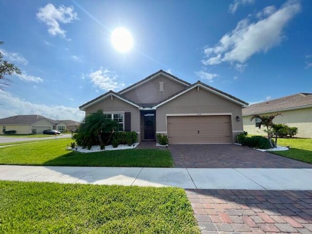 Photo of 10574 SW Cambria Lane, Port Saint Lucie, FL 34987 (MLS # B26021138)