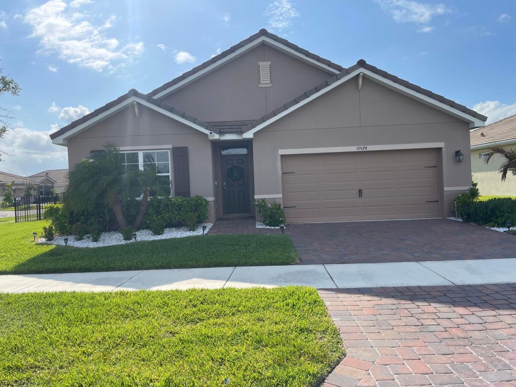 Photo of 10574 SW Cambria Lane, Port Saint Lucie, FL 34987 (MLS # B26021138)