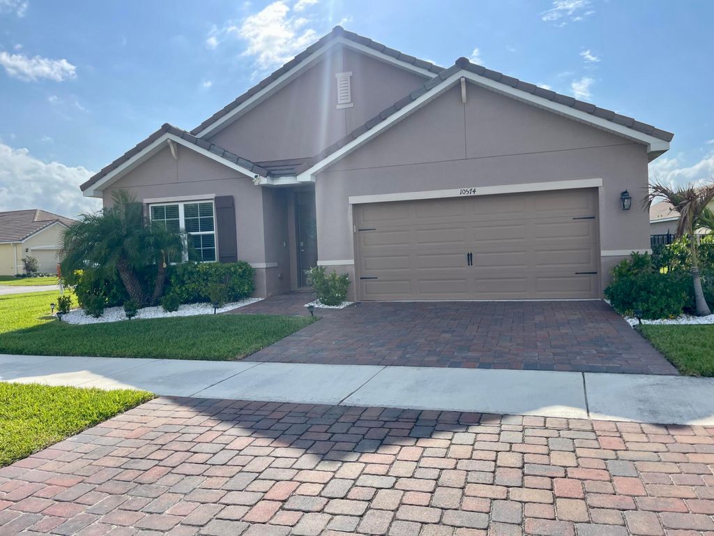 Photo of 10574 SW Cambria Lane, Port Saint Lucie, FL 34987 (MLS # B26021138)