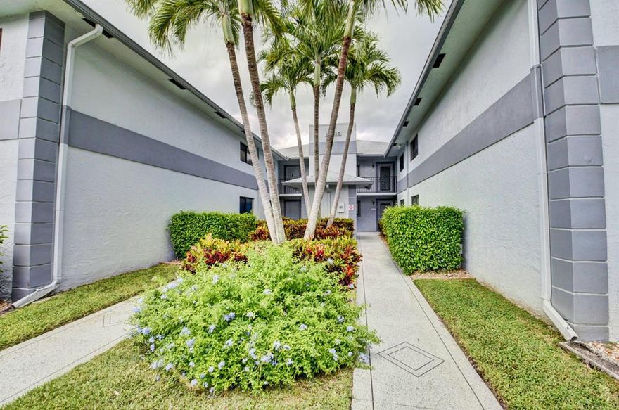 WOW !THIS GROUND FLOOR CORNER UNIT IS STUNNING ONE OF A KIND WITH GARDEN AREAS ALL AROUND  NO EXPENSE HAS BEEN SPARED IN THIS CONDO. NEW SOLID WOOD  KITCHEN, BATHROOMS. PLENTY OF LIGHT. LARGE OPEN SPACE KITCHEN WITH A GORGEOUS GRANITE COUNTER TOP AND BACKSLASH ALL NEW LG  STAINLESS STEEL APPLIANCES WITH A DOUBLE DOOR FRIDGE  BOTH BATHROOMS: NEW VANITIES, FRAIMLESS SHOWER DOOR,AC 2017 NEW SAMSUNG WASHER AND DRYER AND BRAND NEW WINDOW TREATMENTS  A MUST SEE!