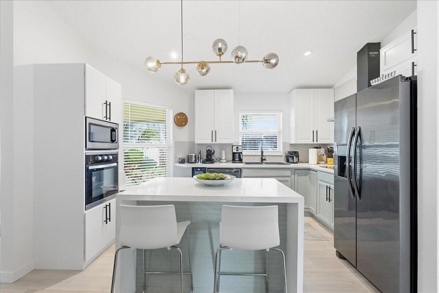 Updated 3BR/2BA 1 story villa in Scarborough community of Davie. Oversized  9,000 sq ft lot—rare to find. Open-concept layout, updated kitchen w quartz countertops & new appliances, impact glass throughout w tint, brand new AC & a spacious primary suite w walk-in closet. Enjoy outdoor living w a large covered patio, expansive backyard, & fire pit. 2 car driveway, low HOA w resort-style amenities. Pool, hot tub, lakes, playground, & tennis courts.HOA covers backyard landscaping too NO HOA APPROVAL REQUIRED. Pet-friendly community conveniently located minutes to I-595, Nova Southeastern, top A rated schools, shopping, dining, & Fort Lauderdale Airport. Additional upgrades  incl custom lighting imported from Spain & France. SELLER willing to offer CONCESSIONS at closing towards closing costs. new door levers, deadbolts, and hinges throughout, and an ADT security system with cameras. HOA covers landscaping in the front and backyard.