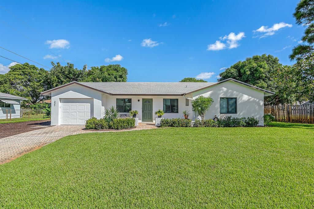 Photo of 327 Pineview Road, Tequesta, FL 33469 (MLS # R10750222)