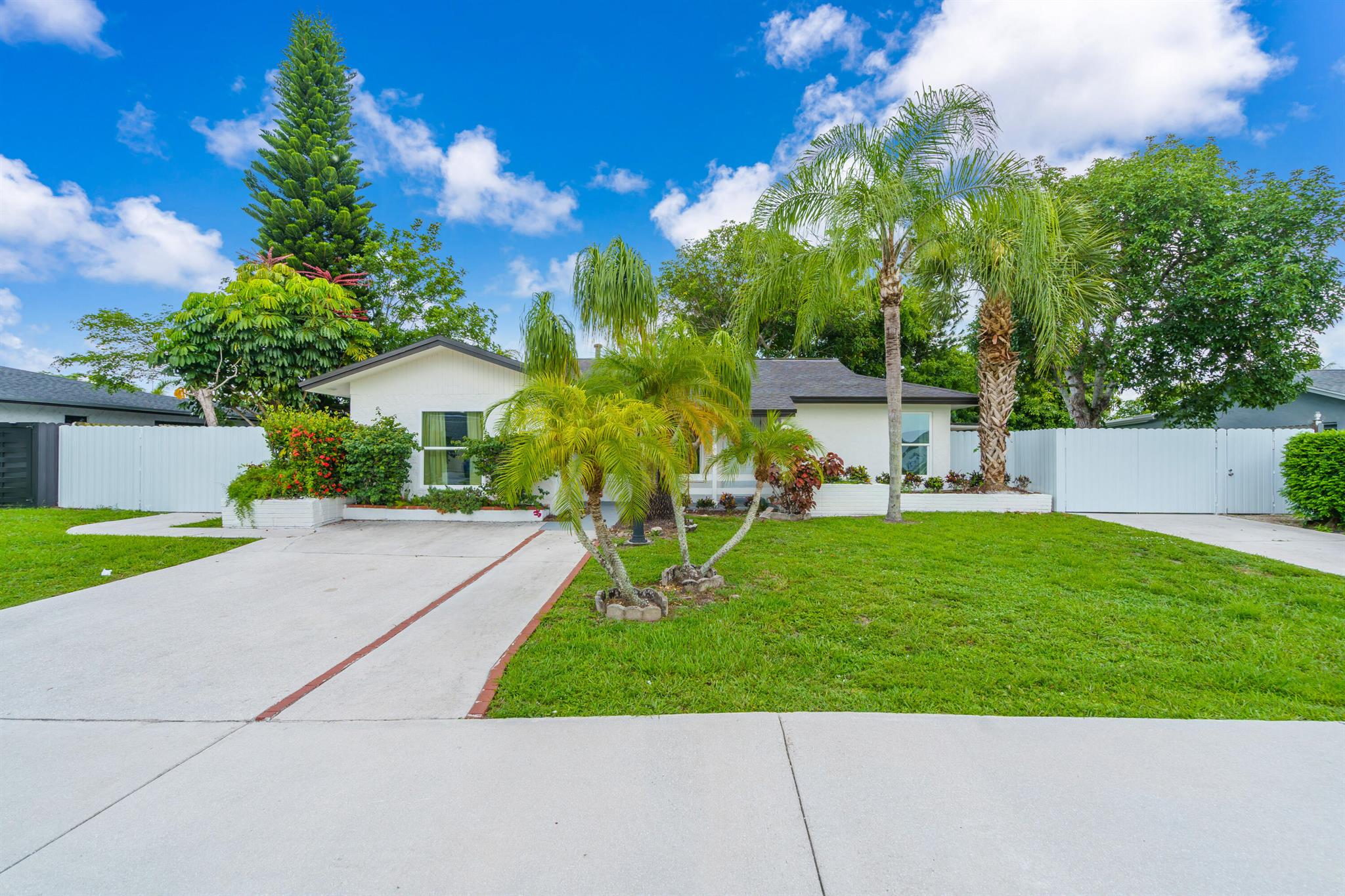 Completely Remodeled Home! Featuring 4 bedrooms and 3 bathrooms, this stunning property includes a private mother-in-law suite with its own separate entrance for added privacy. Enjoy brand-new appliances, impact windows, a new tankless water heater, modern kitchen cabinets with granite countertops, beautifully renovated bathrooms, new lighting, and so much more! This House is a must see ....