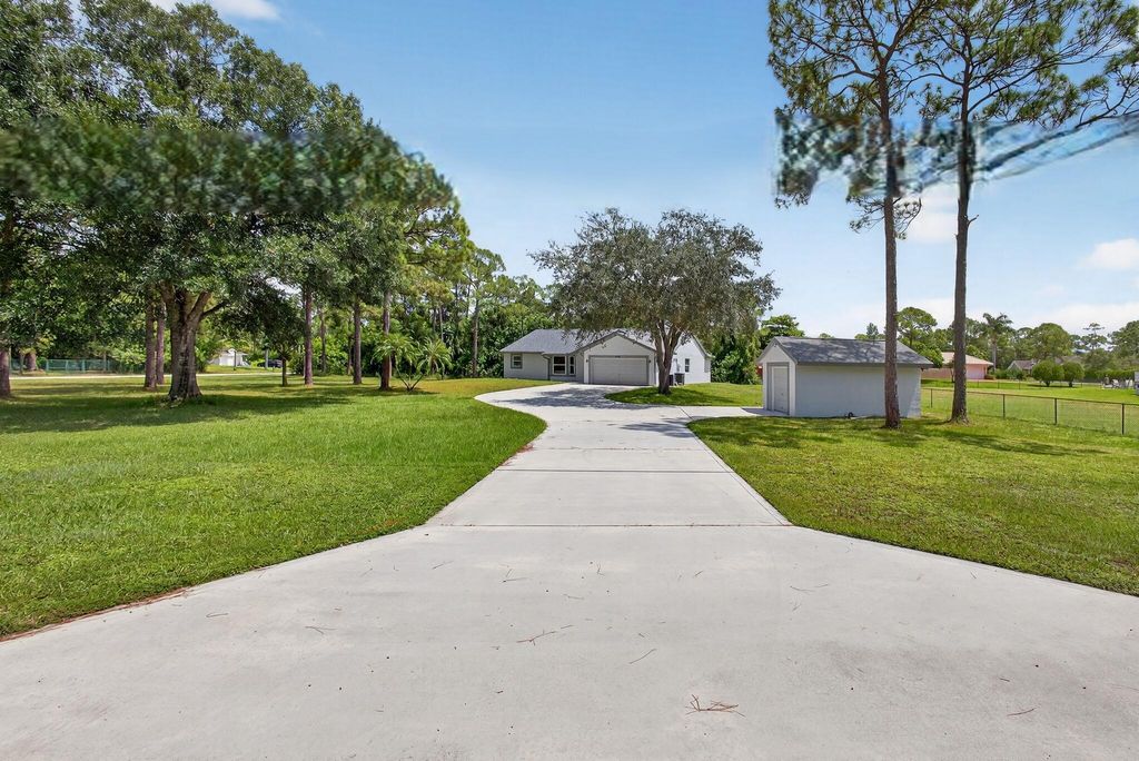 Photo of 16476 86th Street N, The Acreage, FL 33470 (MLS # R11121388)