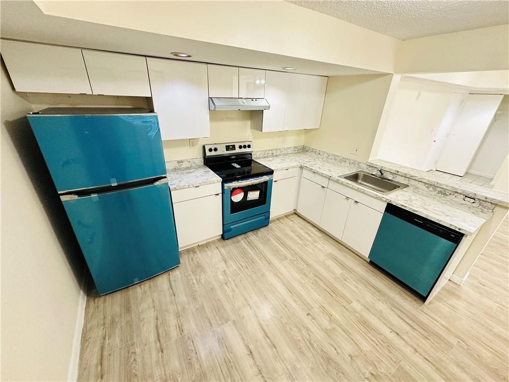 Photo of 5781 Riverside Dr #102A4, Coral Springs, FL 33067 (MLS # F10375785)