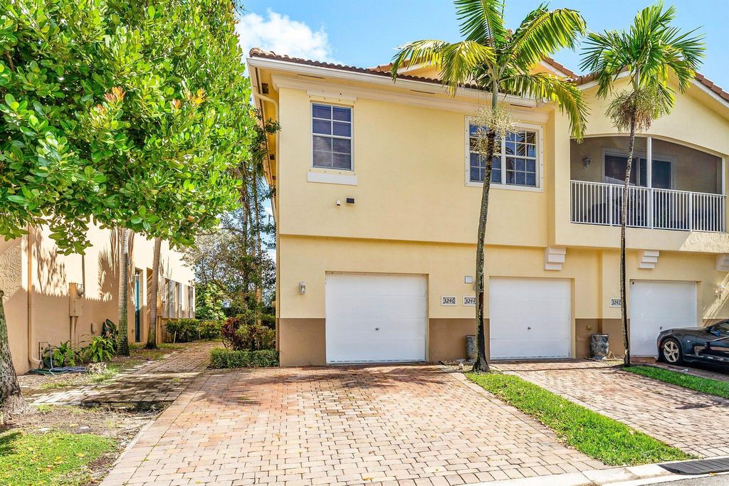 Photo of 3246 Mirella Drive, Riviera Beach, FL 33404 (MLS # R11136928)